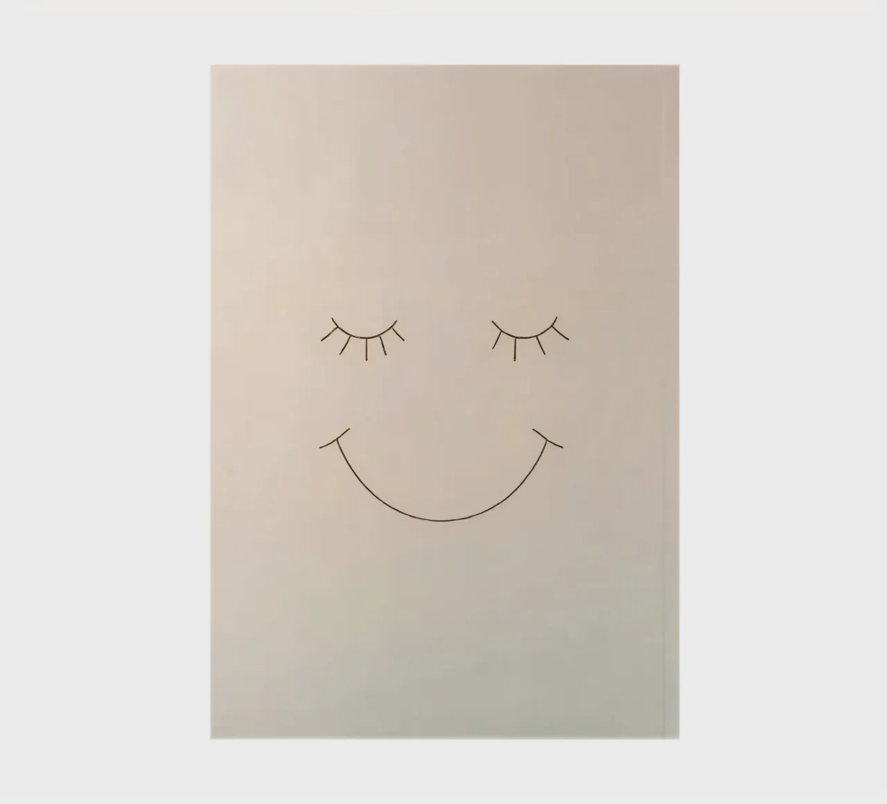 Simple drawing of a face with closed eyes and a smile notebook by DesignDoodle