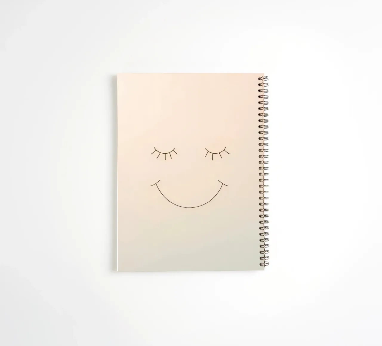 Simple drawing of a face with closed eyes and a smile spiral notebook by DesignDoodle