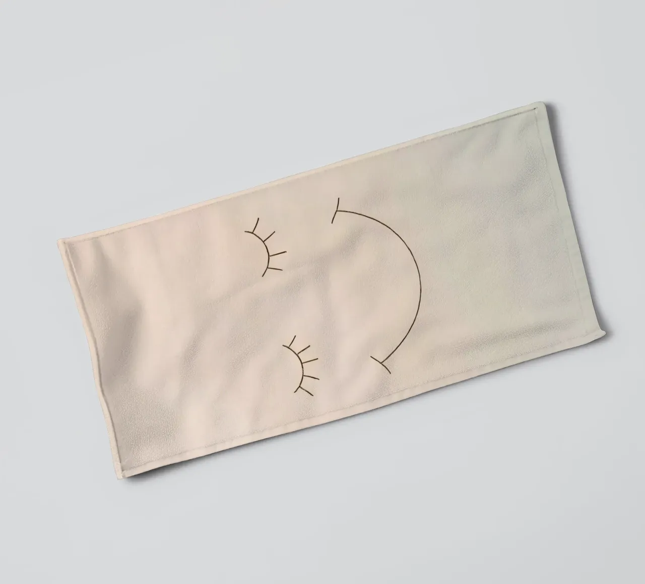Simple drawing of a face with closed eyes and a smile towel by DesignDoodle