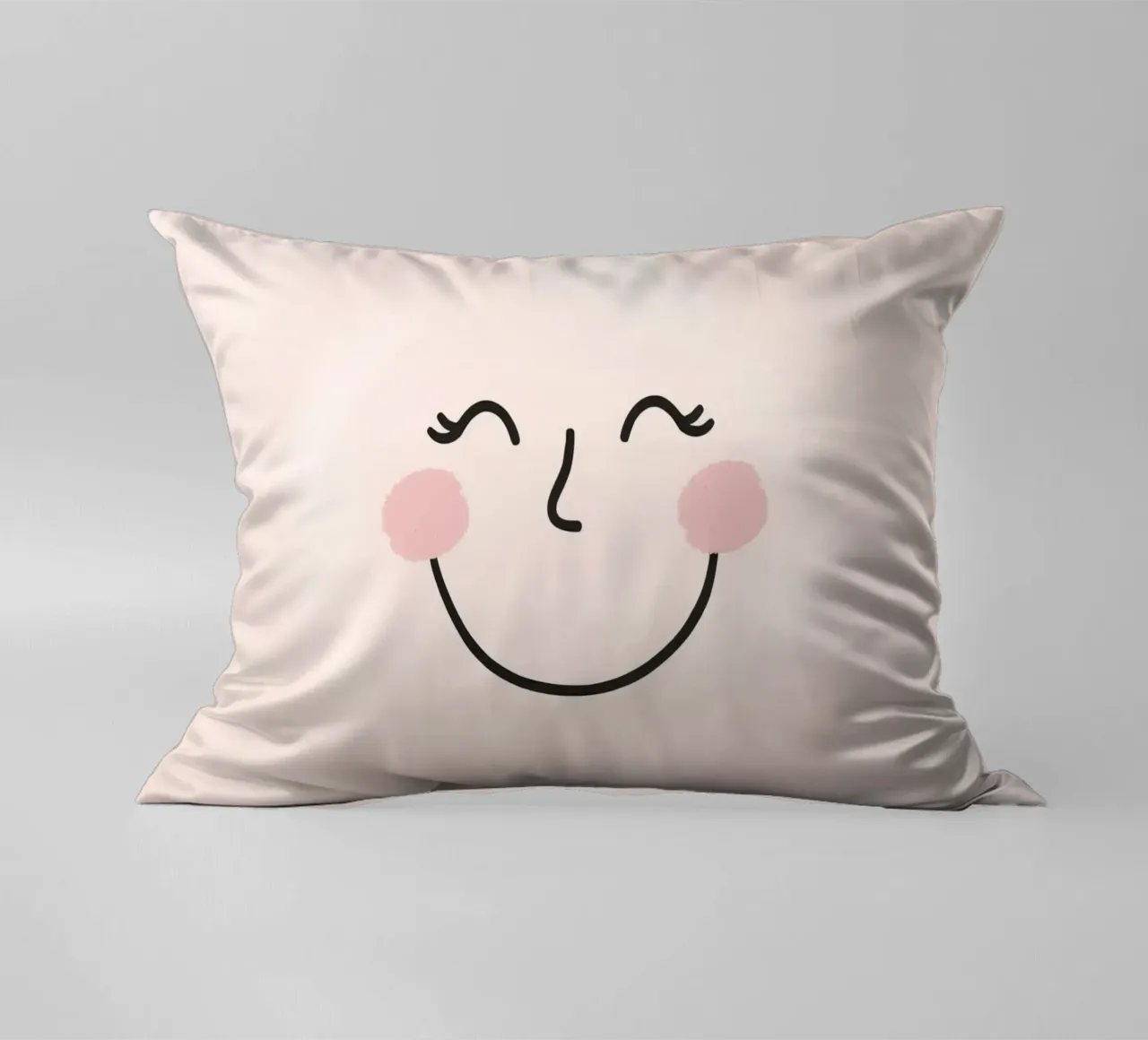 Disegno di una faccia felice su sfondo rosa chiaro cuscino da DesignDoodle