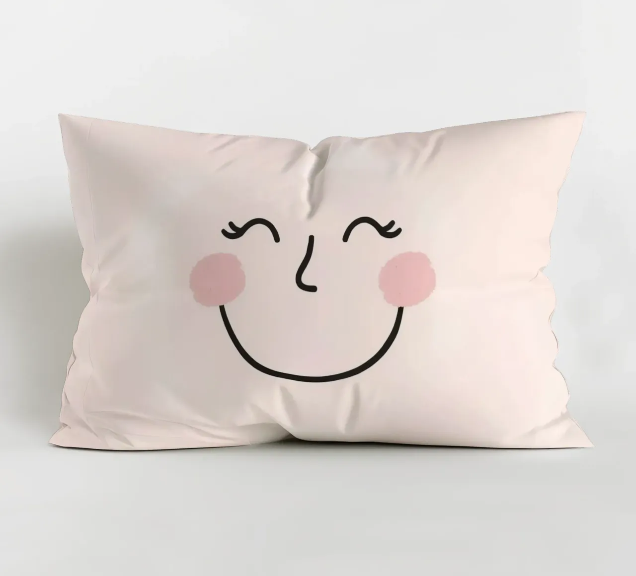 Disegno di una faccia felice su sfondo rosa chiaro cuscino da DesignDoodle