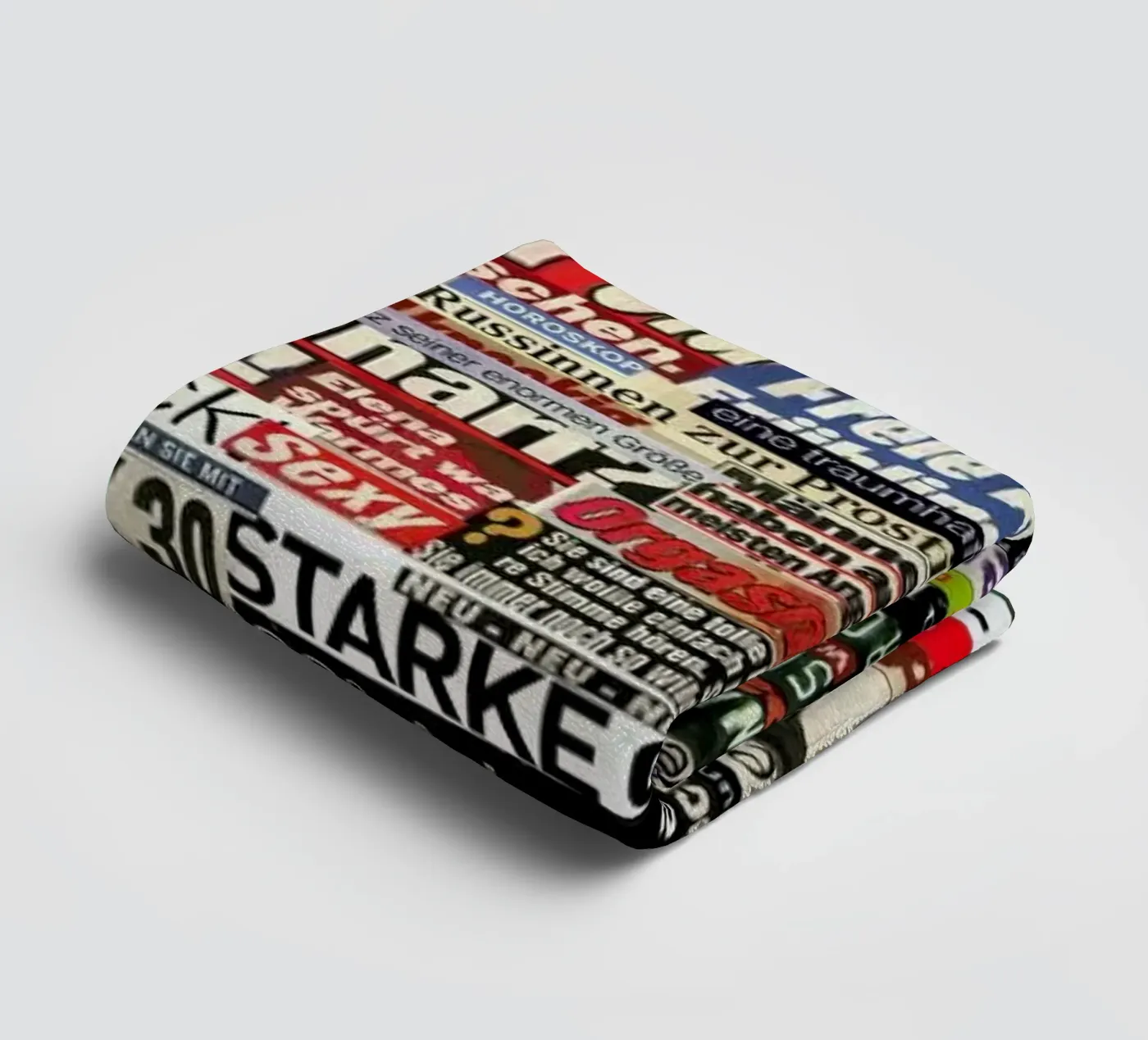 Headlines, 2005 badhanddoek van Gothans Papierwelten