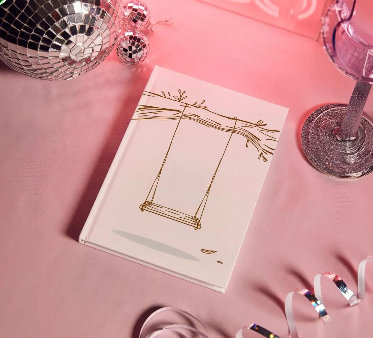 Line art of a swing hanging from a tree branch with leaves notebook by DesignDoodle