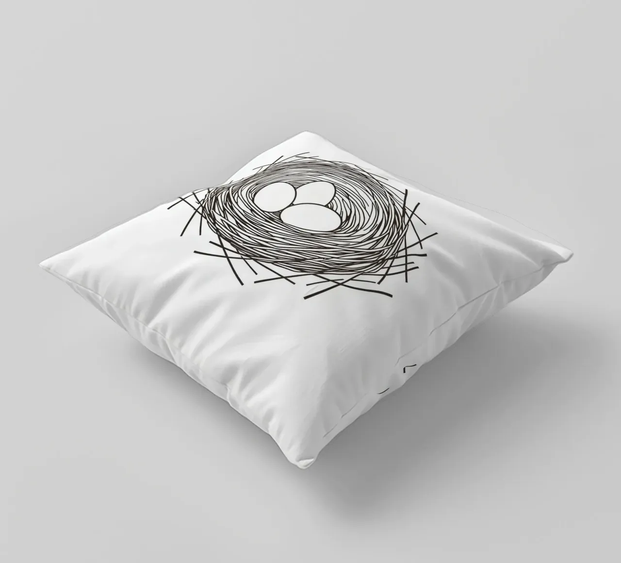 Nest containing three eggs depicted with line art decorative cushion by DesignDoodle