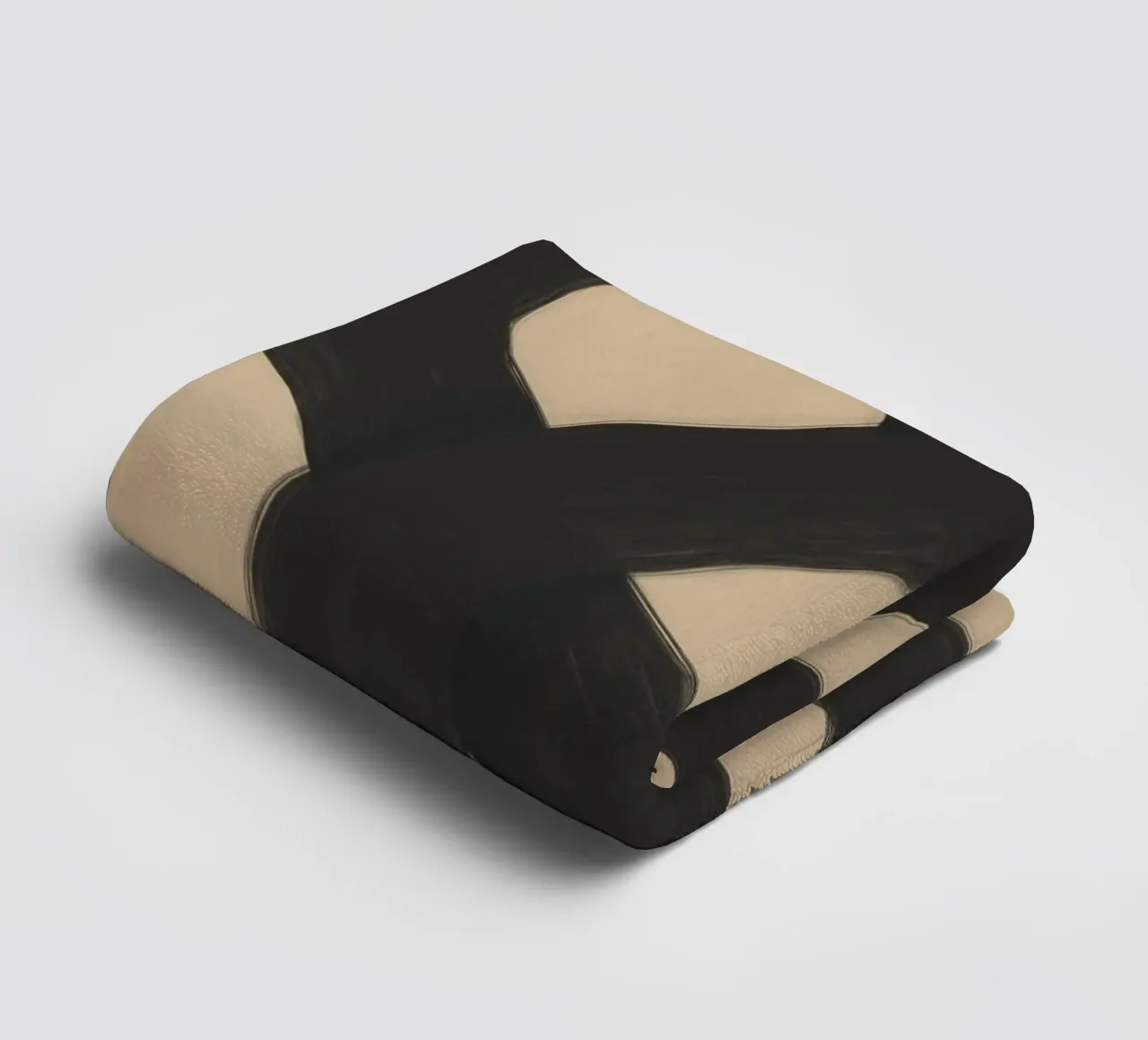 Interlocking black towel by Little Dean