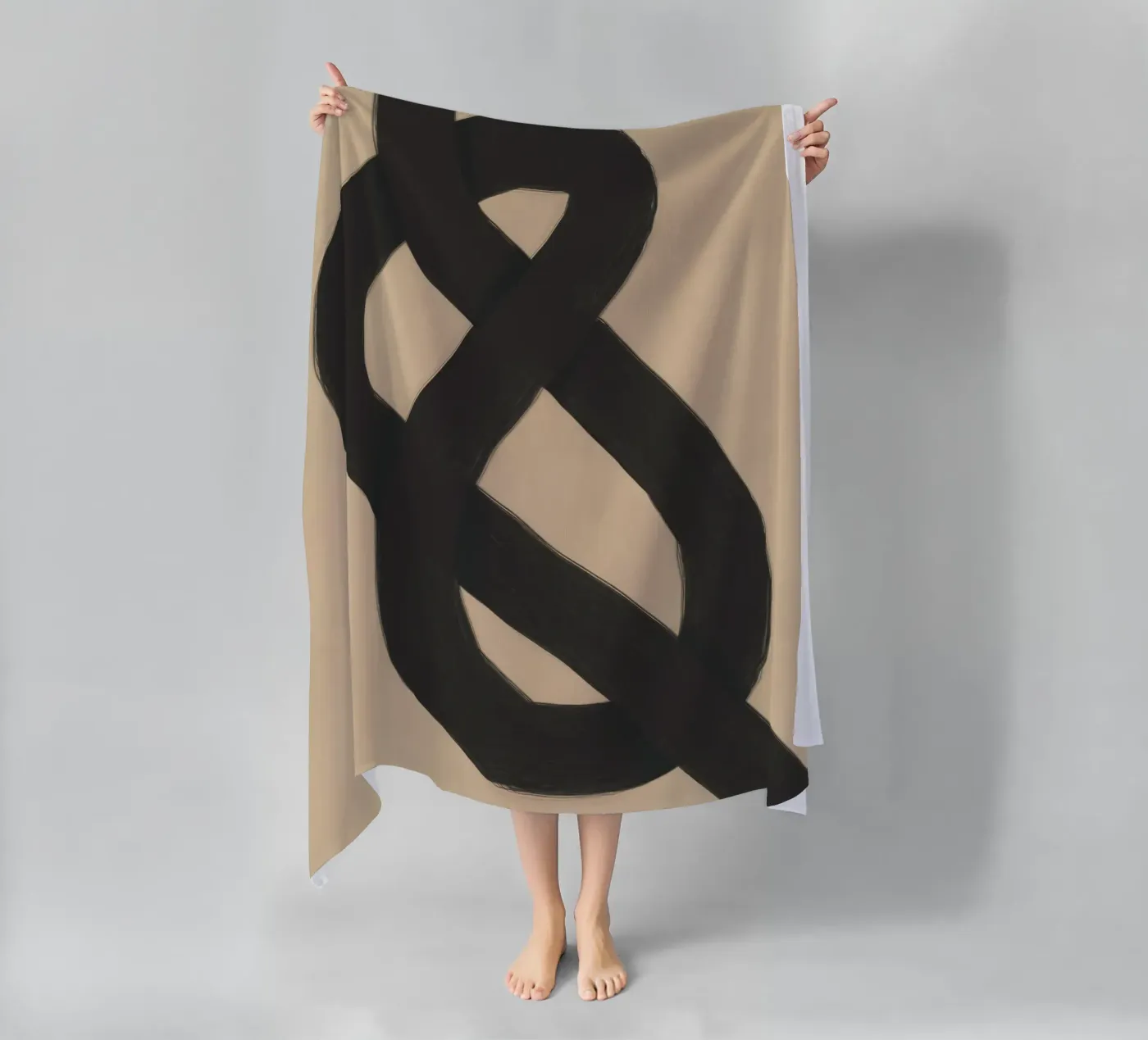 Interlocking black beach towel by Little Dean