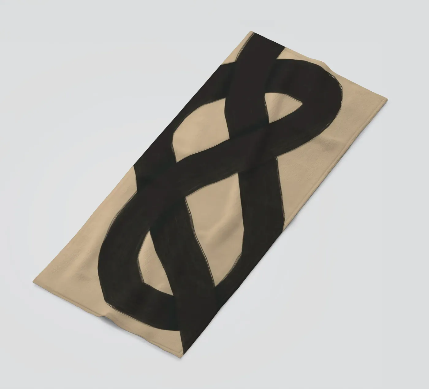 Interlocking black beach towel by Little Dean