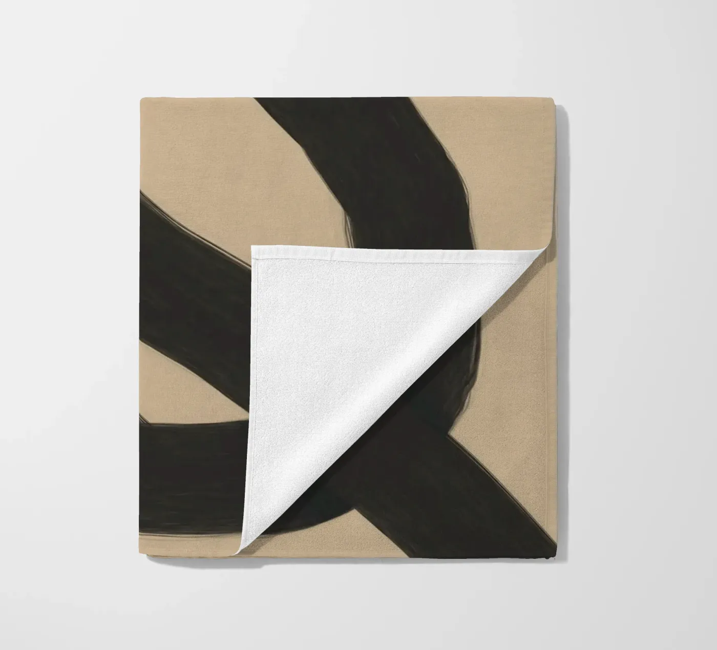 Interlocking black beach towel by Little Dean