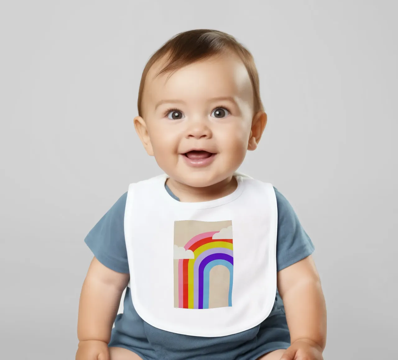 Rainbow and Clouds baby bib by Little Flourishes