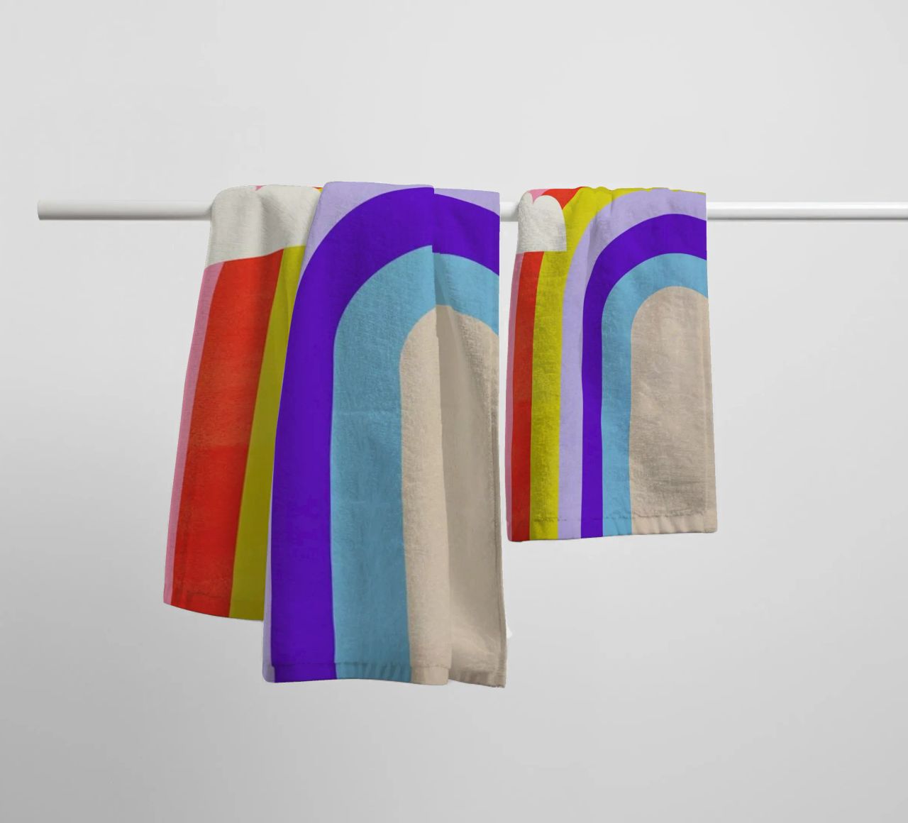 Rainbow and Clouds towel by Little Flourishes