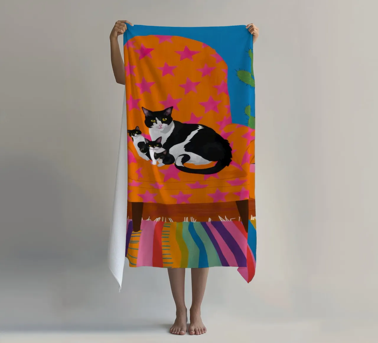 Poltrona arancione Catnap telo mare da Marigold Tiga