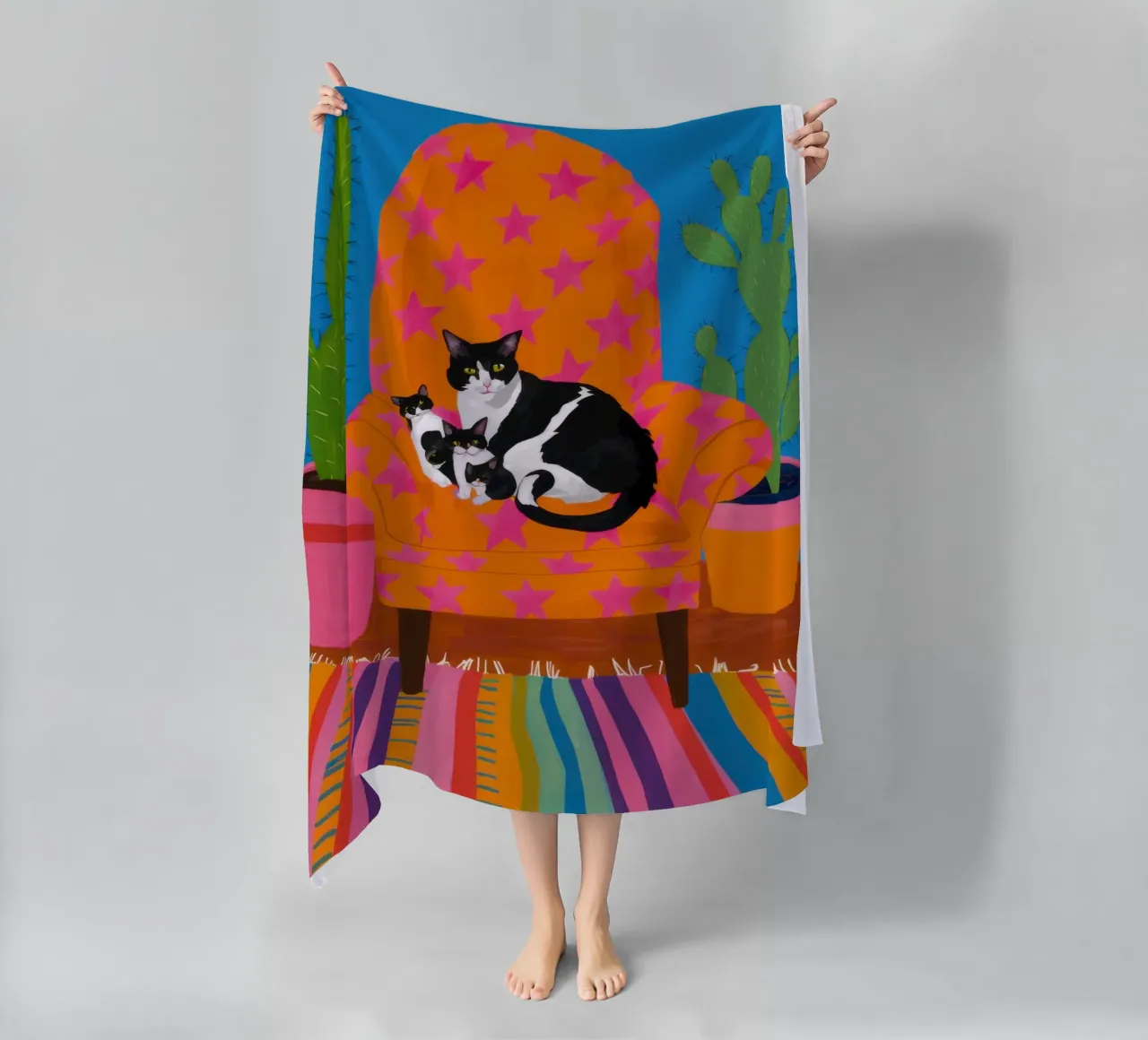 Poltrona arancione Catnap telo mare da Marigold Tiga