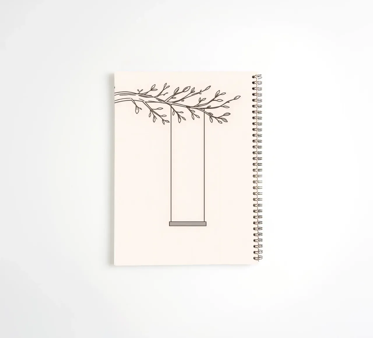 Empty swing hanging from a tree branch in a minimalist art spiral notebook by DesignDoodle