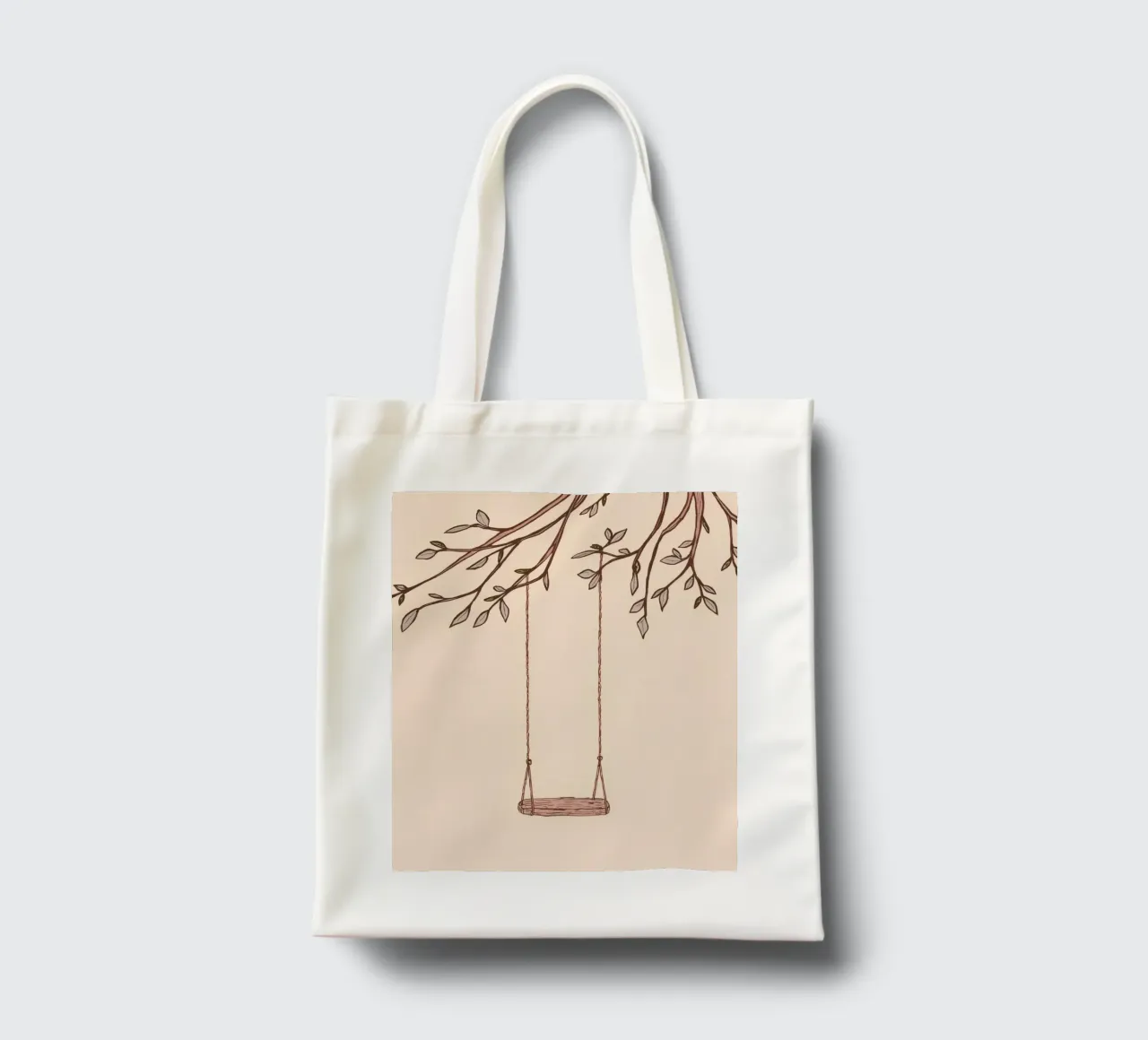 Swing hanging from a tree branch with delicate leaves tote bag by DesignDoodle