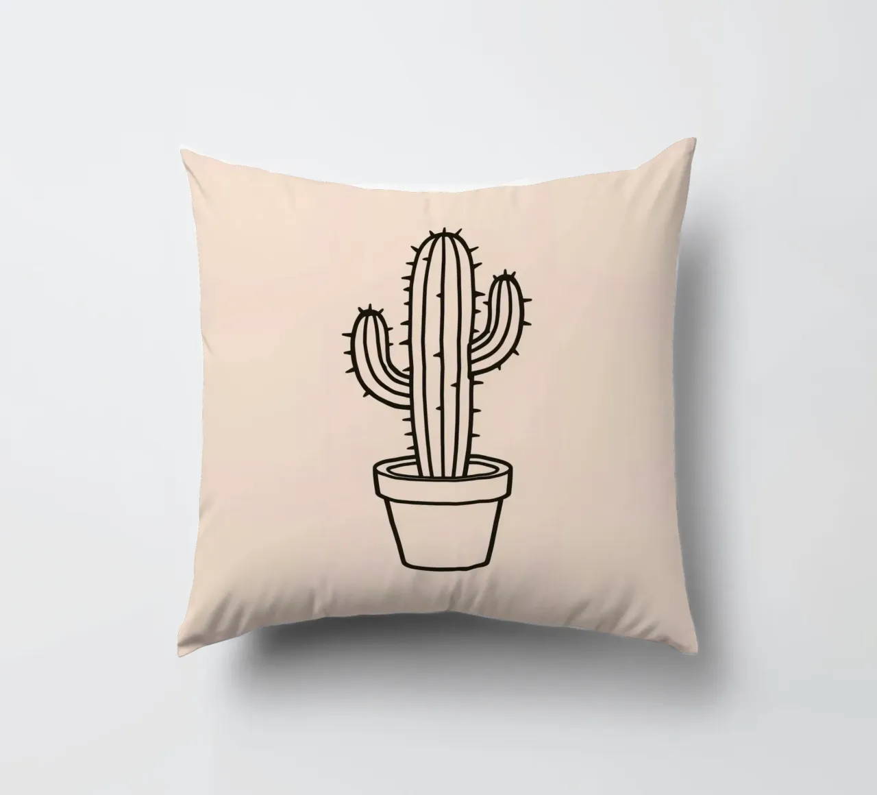 Cactus in un semplice vaso esposto su uno sfondo semplice cuscino da DesignDoodle