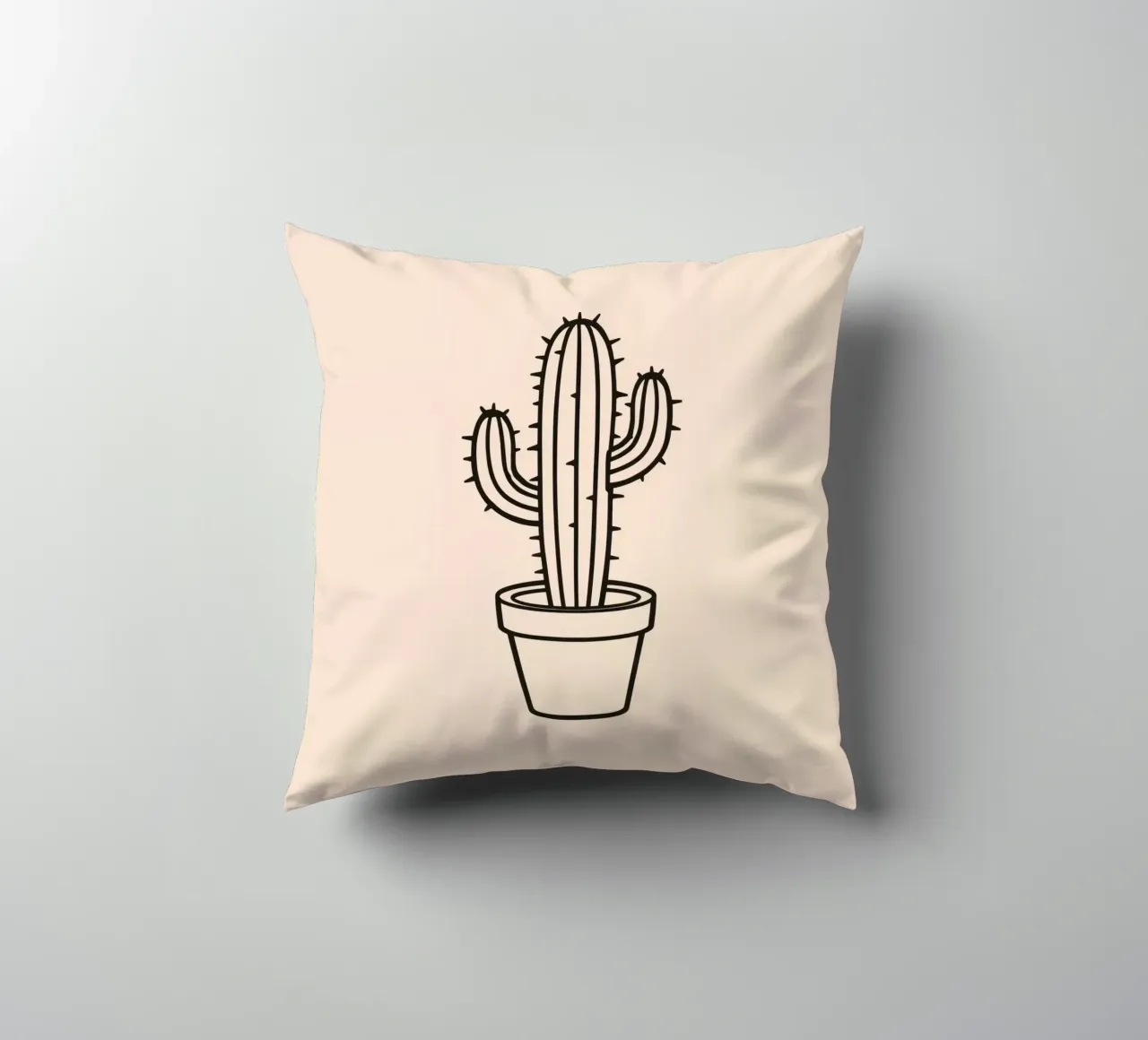 Cactus in un semplice vaso esposto su uno sfondo semplice cuscino da DesignDoodle