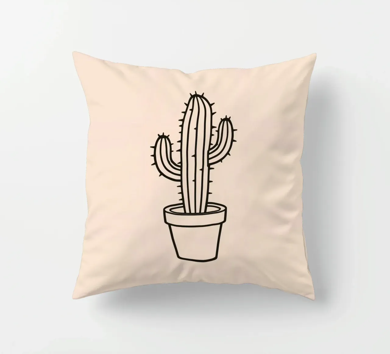 Cactus in un semplice vaso esposto su uno sfondo semplice cuscino da DesignDoodle
