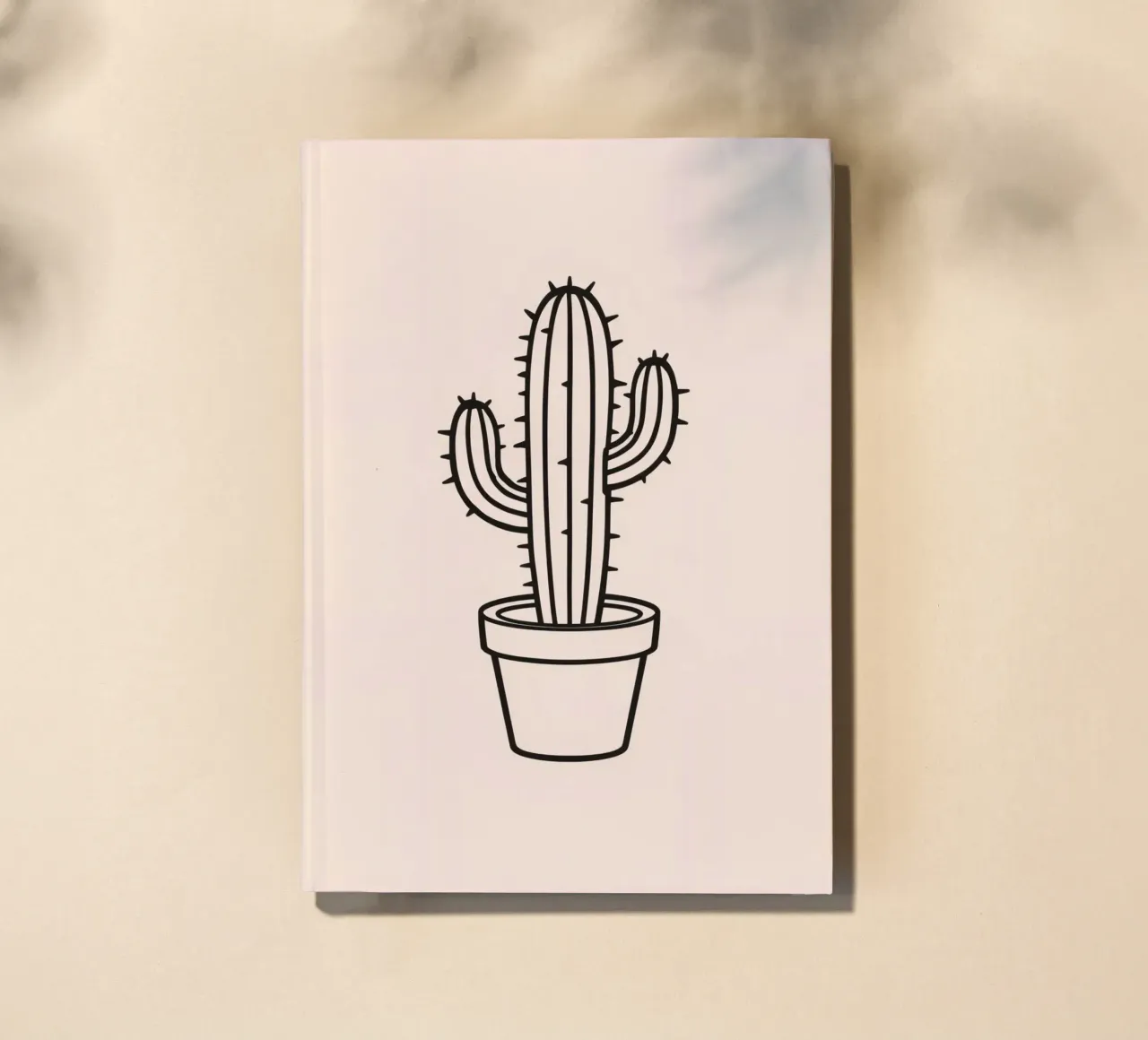 Cactus in a simple pot displayed against a plain background notebook by DesignDoodle