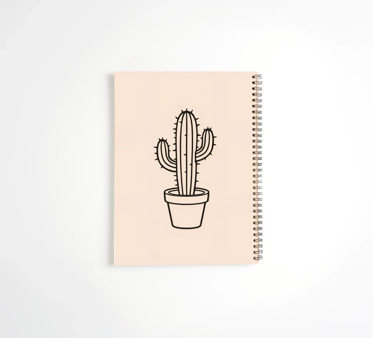 Cactus in a simple pot displayed against a plain background spiral notebook by DesignDoodle