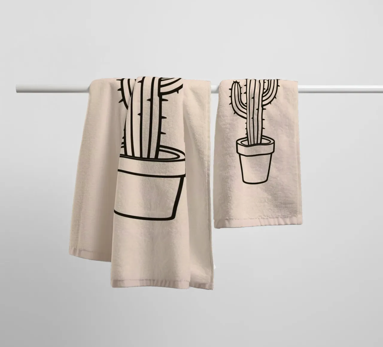 Cactus in a simple pot displayed against a plain background towel by DesignDoodle