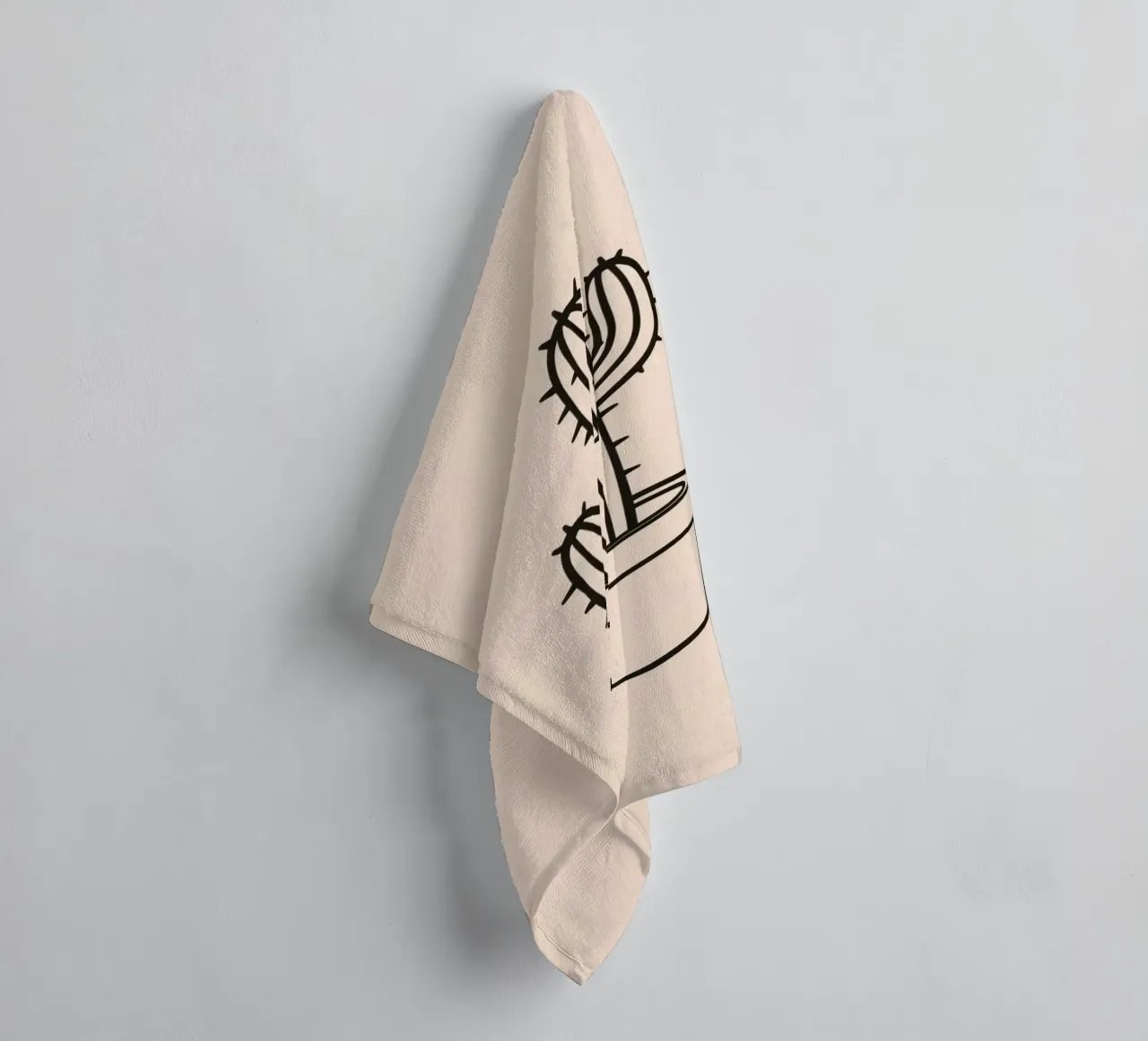 Cactus in a simple pot displayed against a plain background towel by DesignDoodle