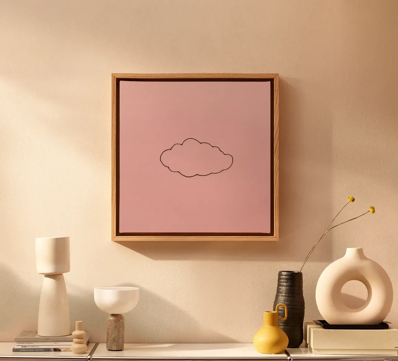 simplistic cloud design on a soft pink art canvas by DesignDoodle