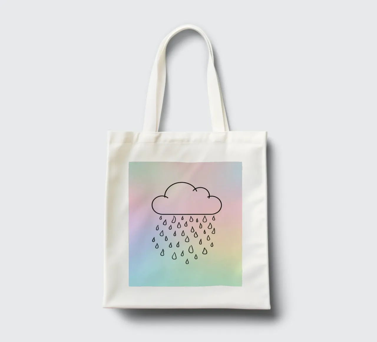 Cloud with rain illustration against a soft background tote bag by DesignDoodle
