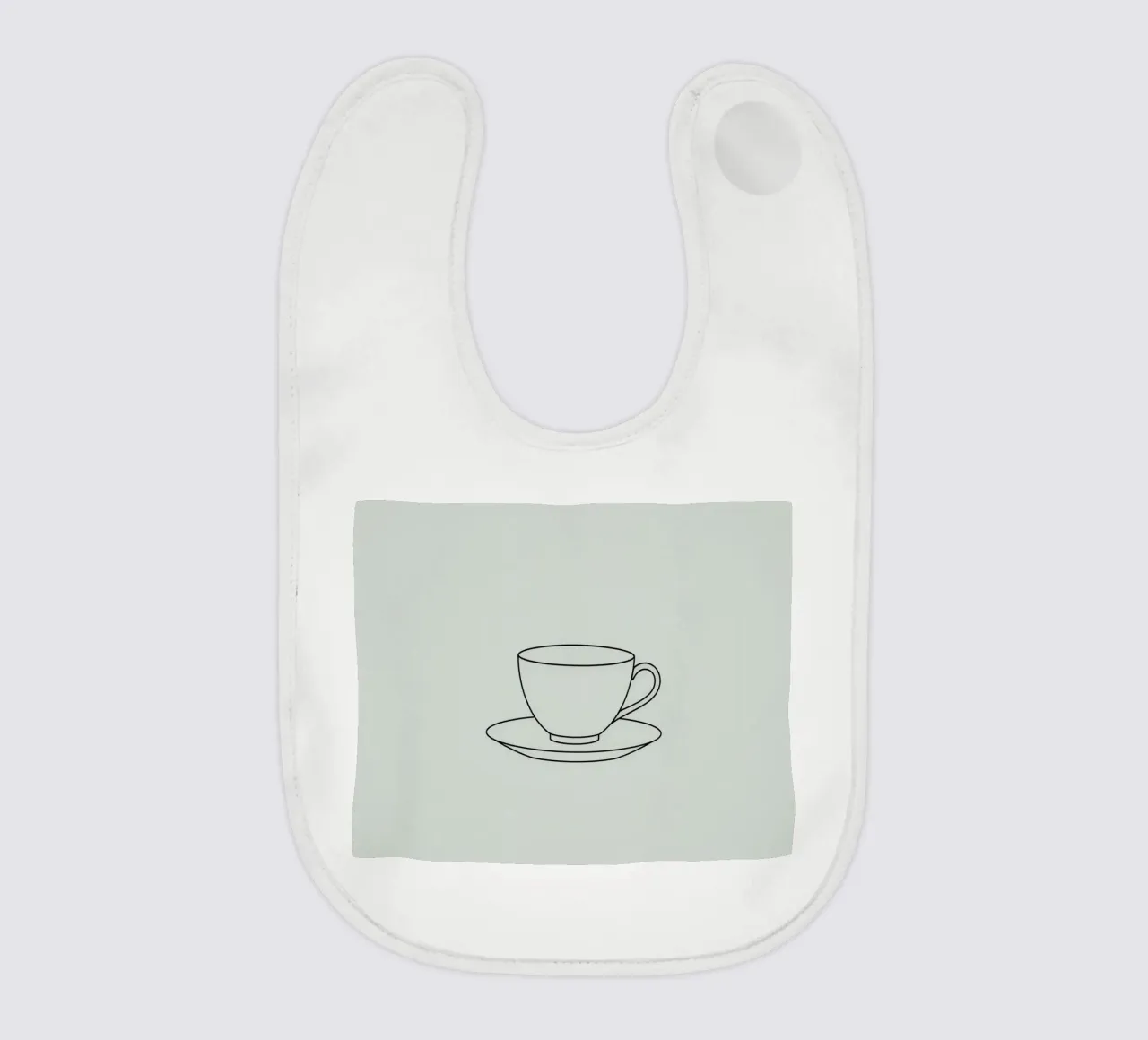 Semplice schizzo di una tazza da tè su un piattino esposto su un minimo bavaglino da DesignDoodle