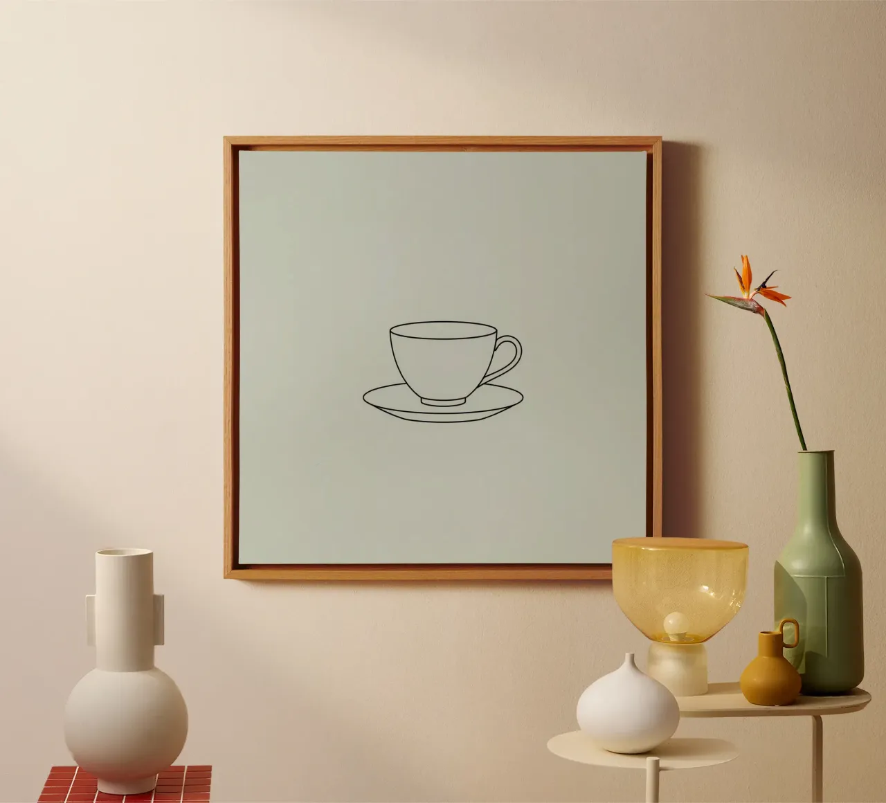 Simple sketch of a tea cup on a saucer displayed on a minima canvas by DesignDoodle