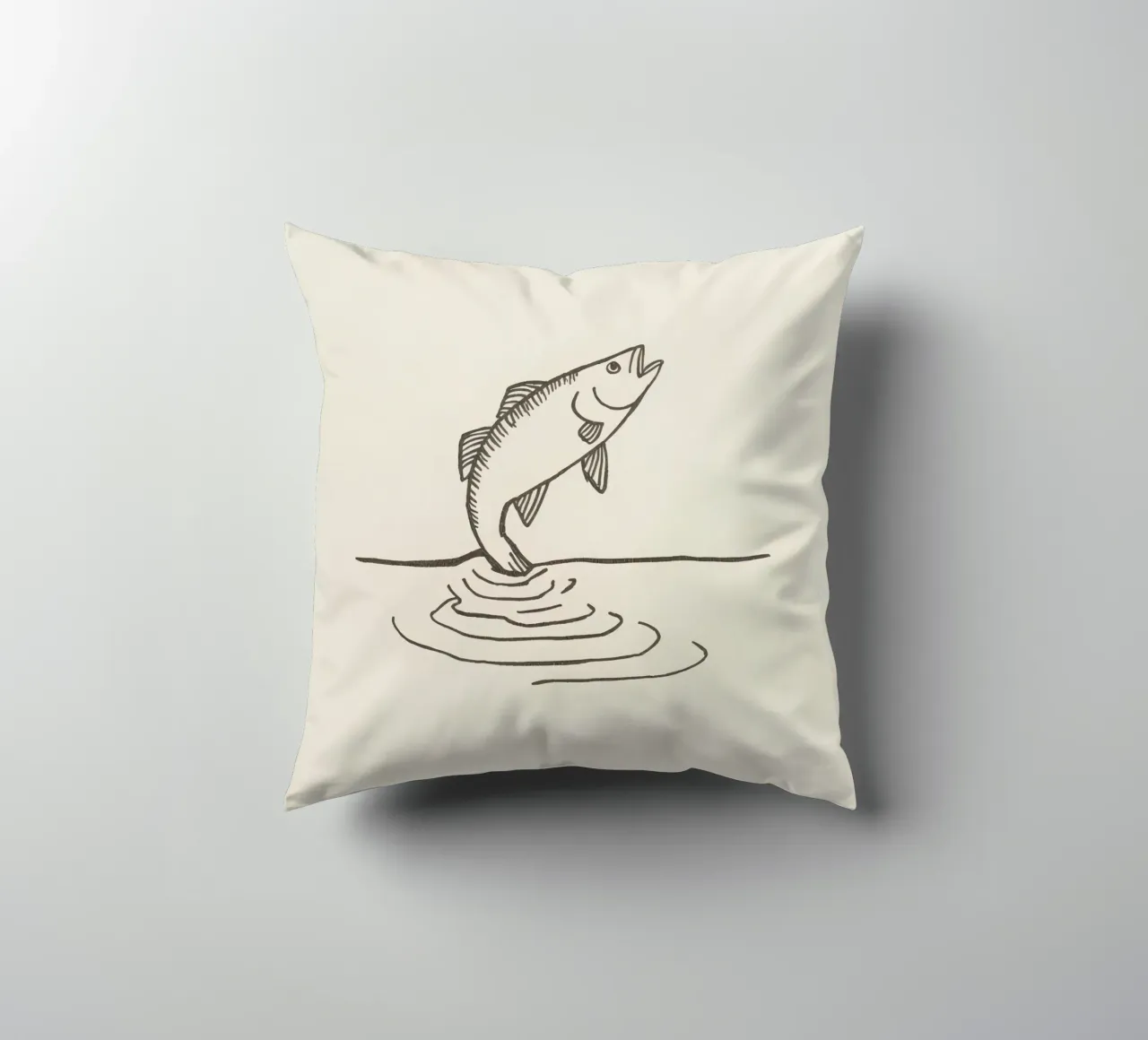 Fish leaping above the water in a natural setting showcasing decorative cushion by DesignDoodle