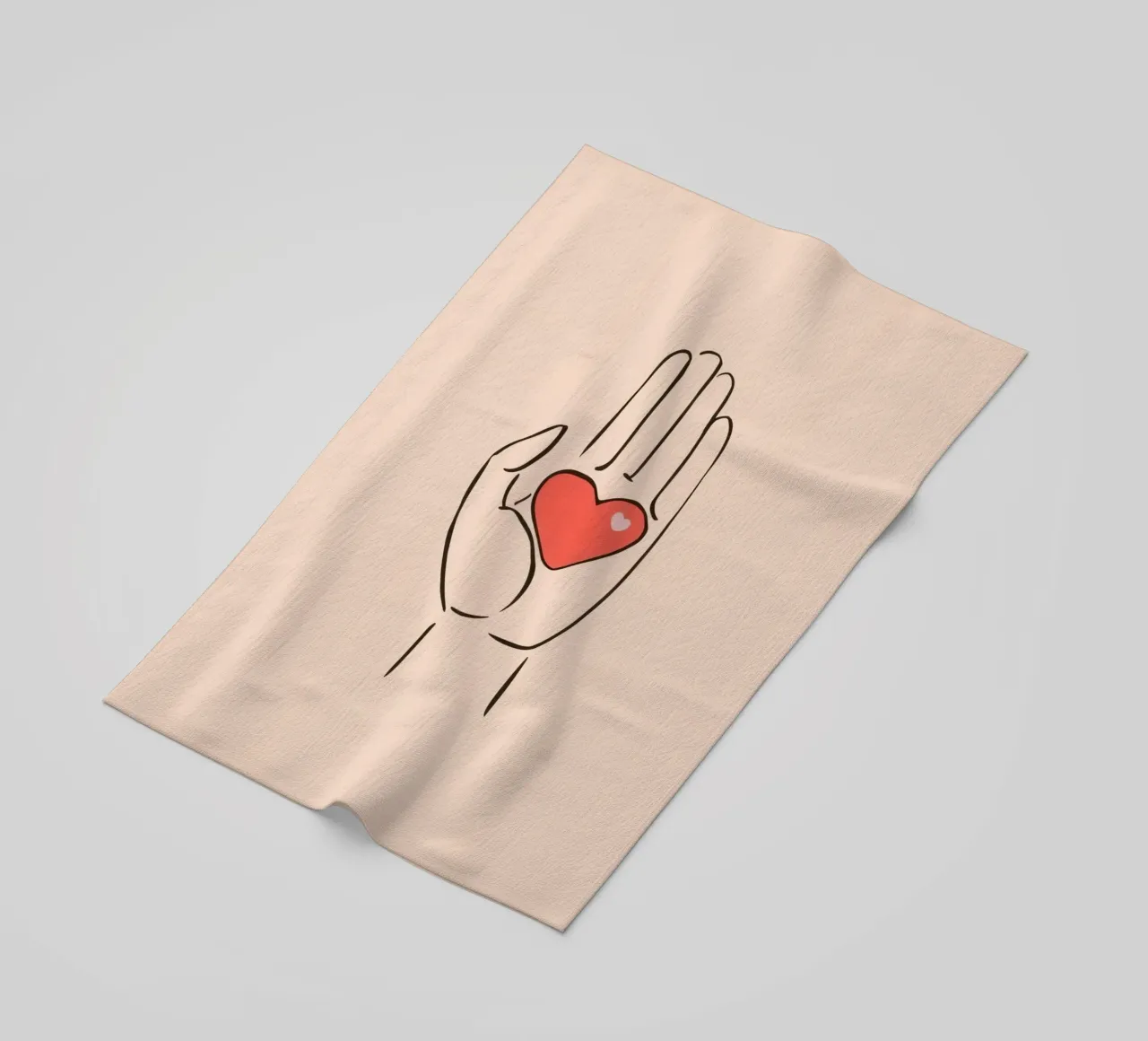 Mano che regge un cuore che rappresenta amore e gentilezza telo mare da DesignDoodle