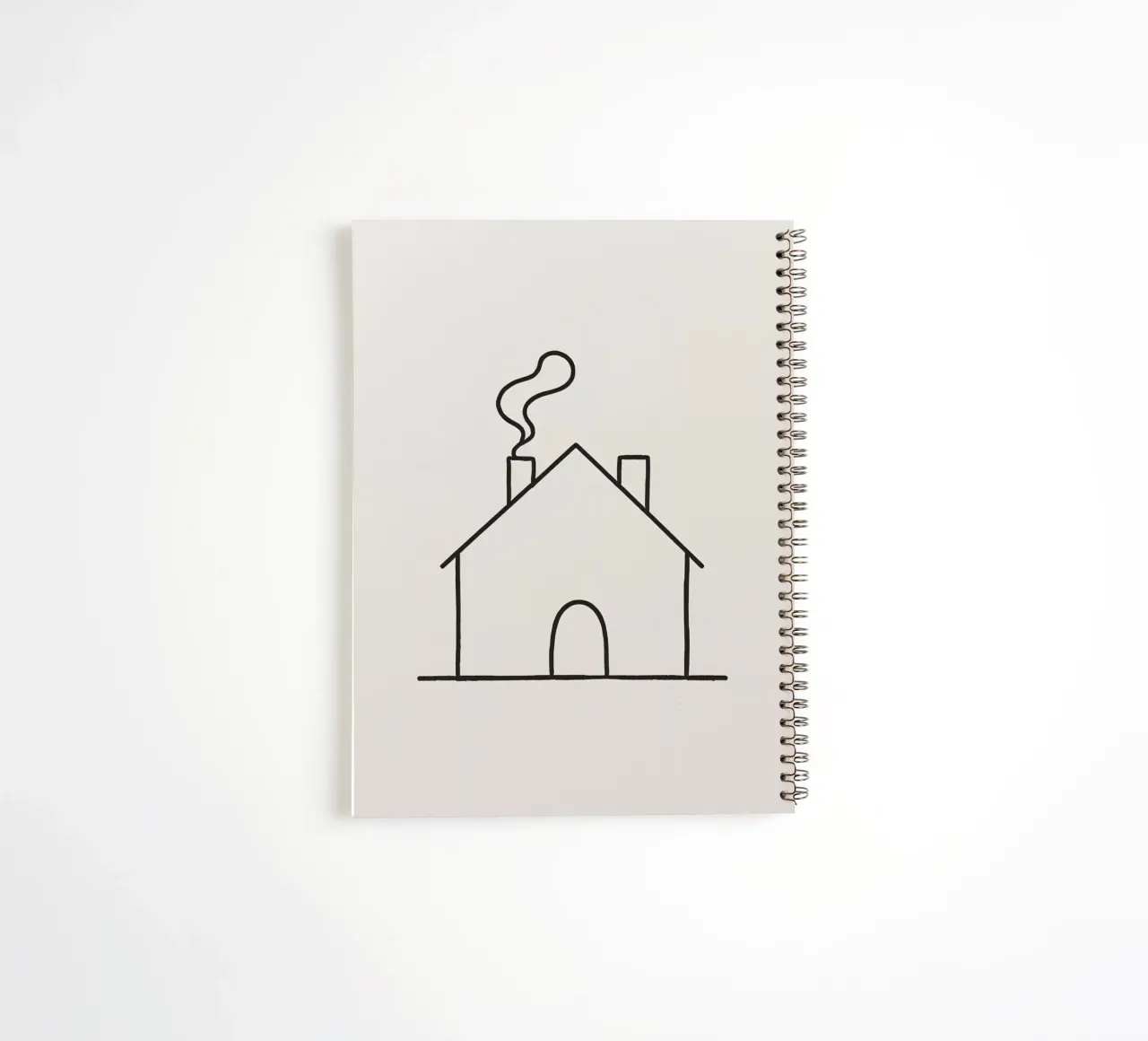 Simple outline of a house with smoke rising from the chimney spiral notebook by DesignDoodle