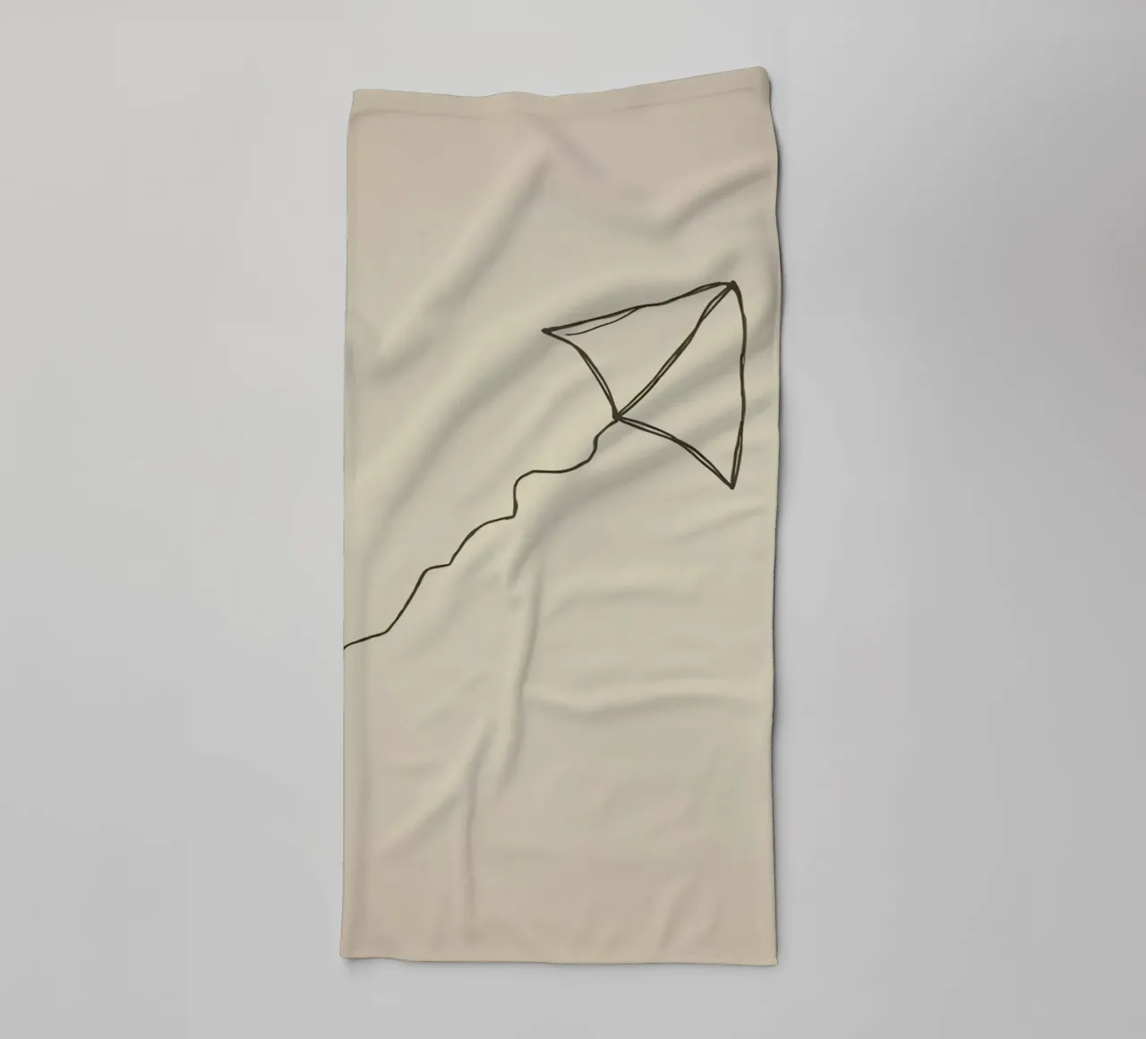 Kite soaring with a flowing tail attached, showcasing joyful towel by DesignDoodle
