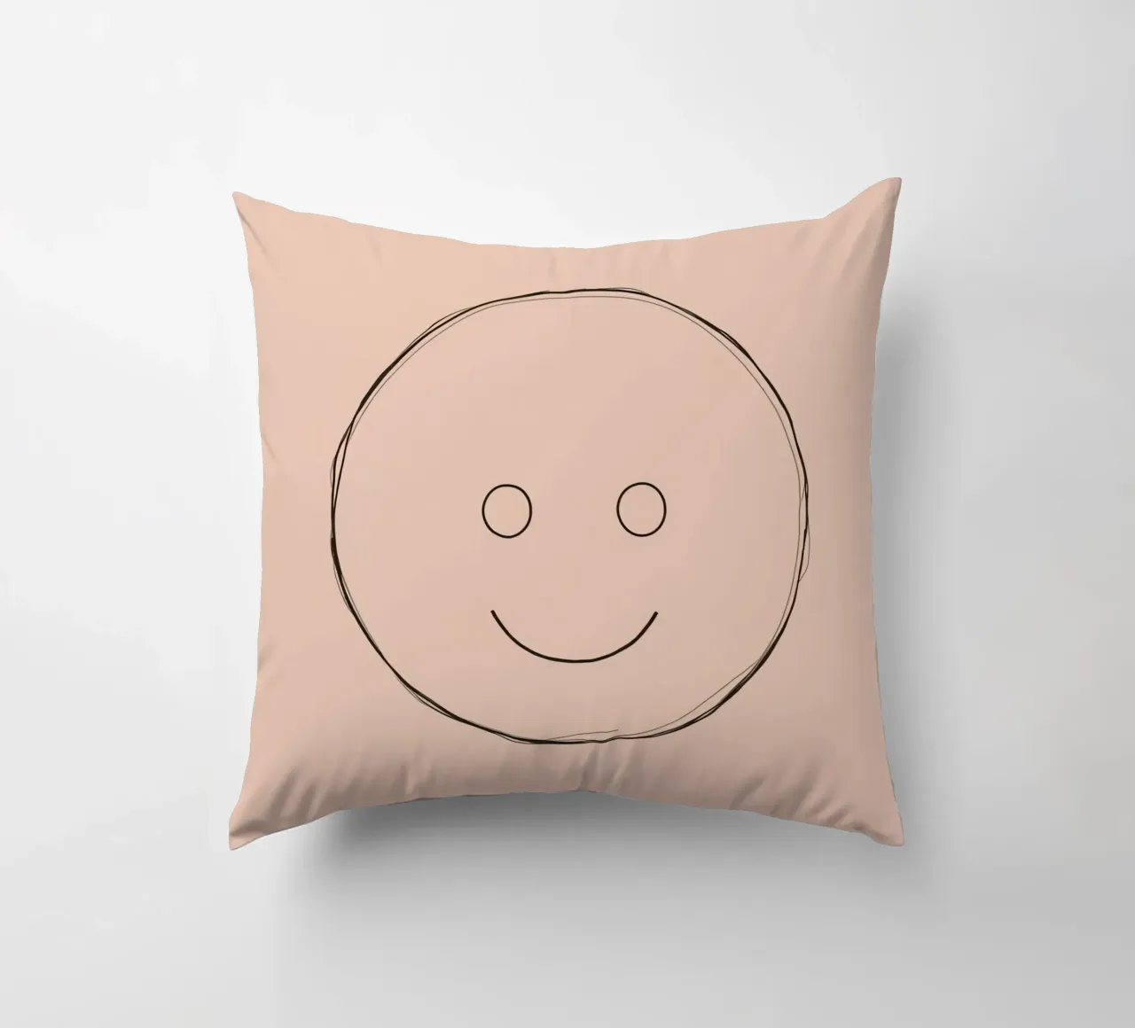 Illustrazione di una semplice faccina sorridente su sfondo color pesca cuscino da DesignDoodle