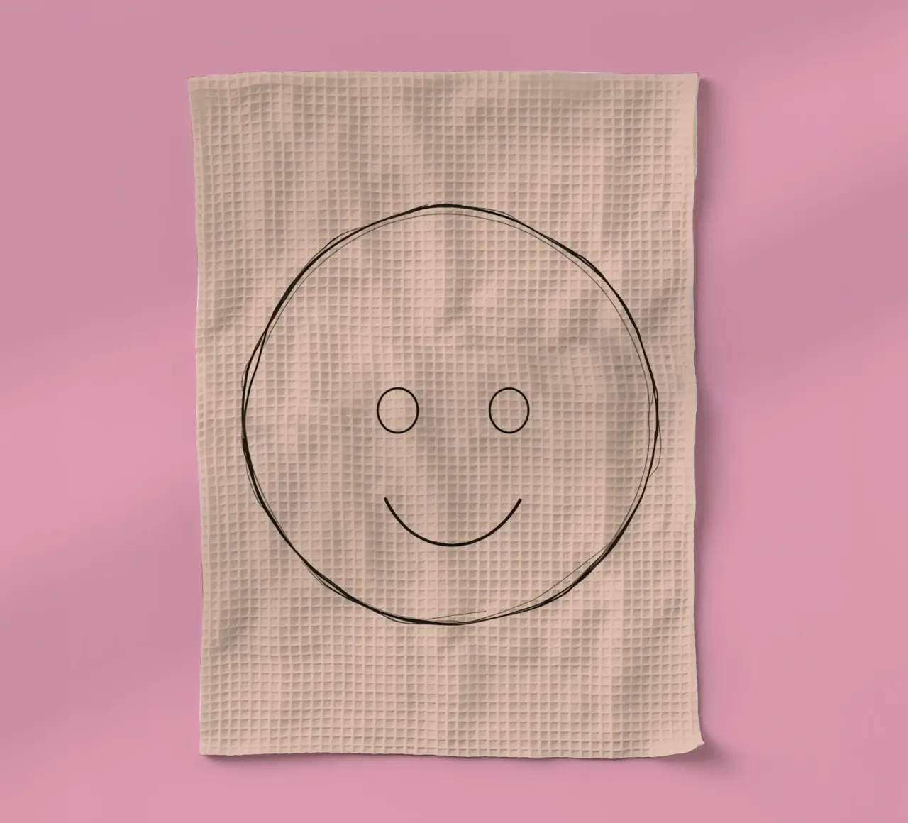 Illustration d'un smiley simple sur un fond de pêche uni torchon de DesignDoodle
