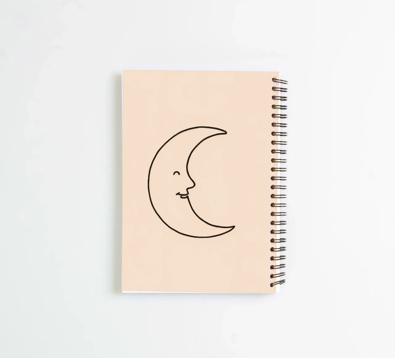 Crescent moon with a smiling face on a soft background spiral notebook by DesignDoodle