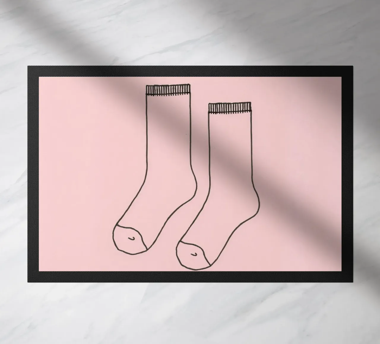 Simple design of a pair of socks with a pink background doormat by DesignDoodle