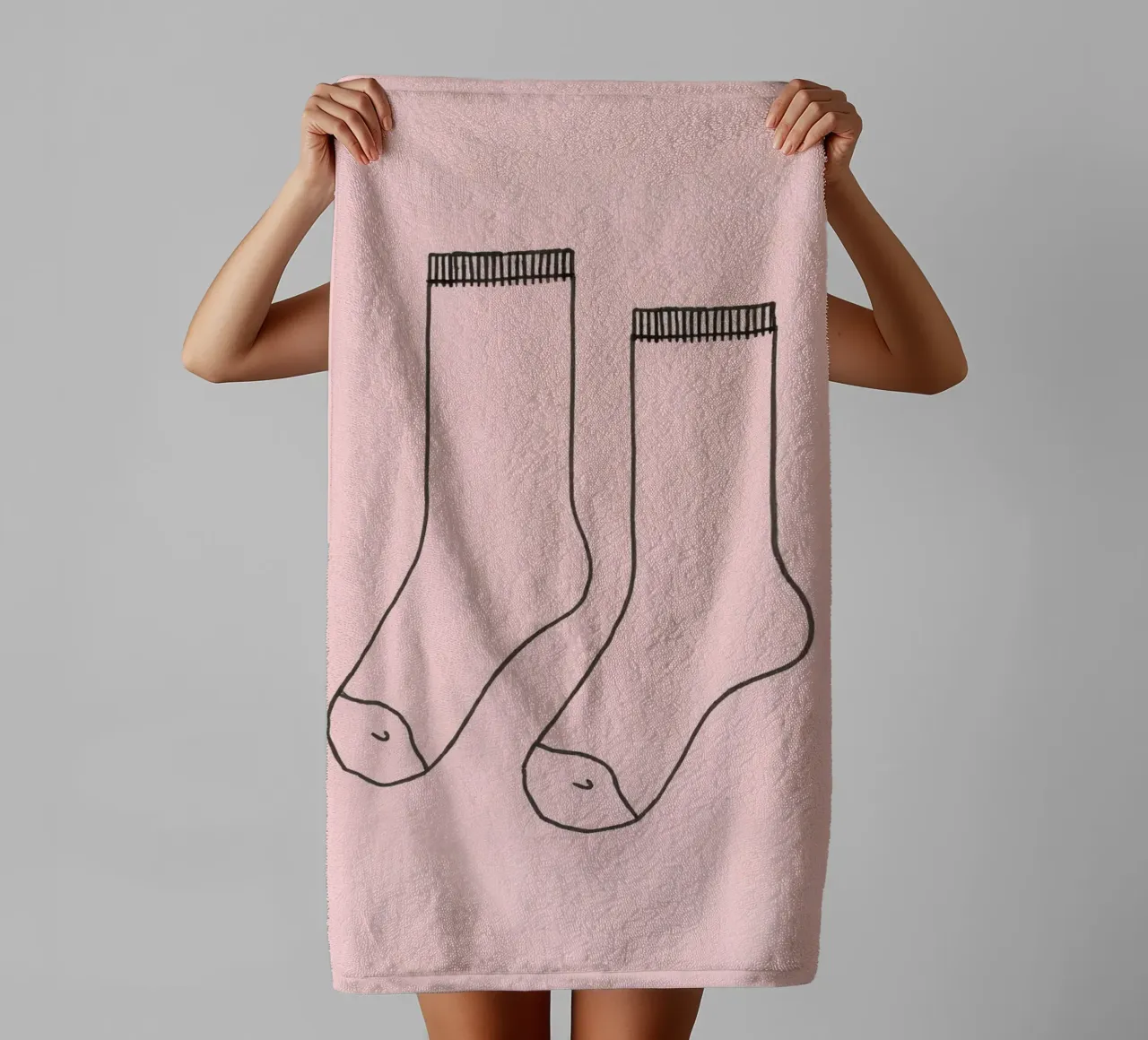 Simple design of a pair of socks with a pink background towel by DesignDoodle
