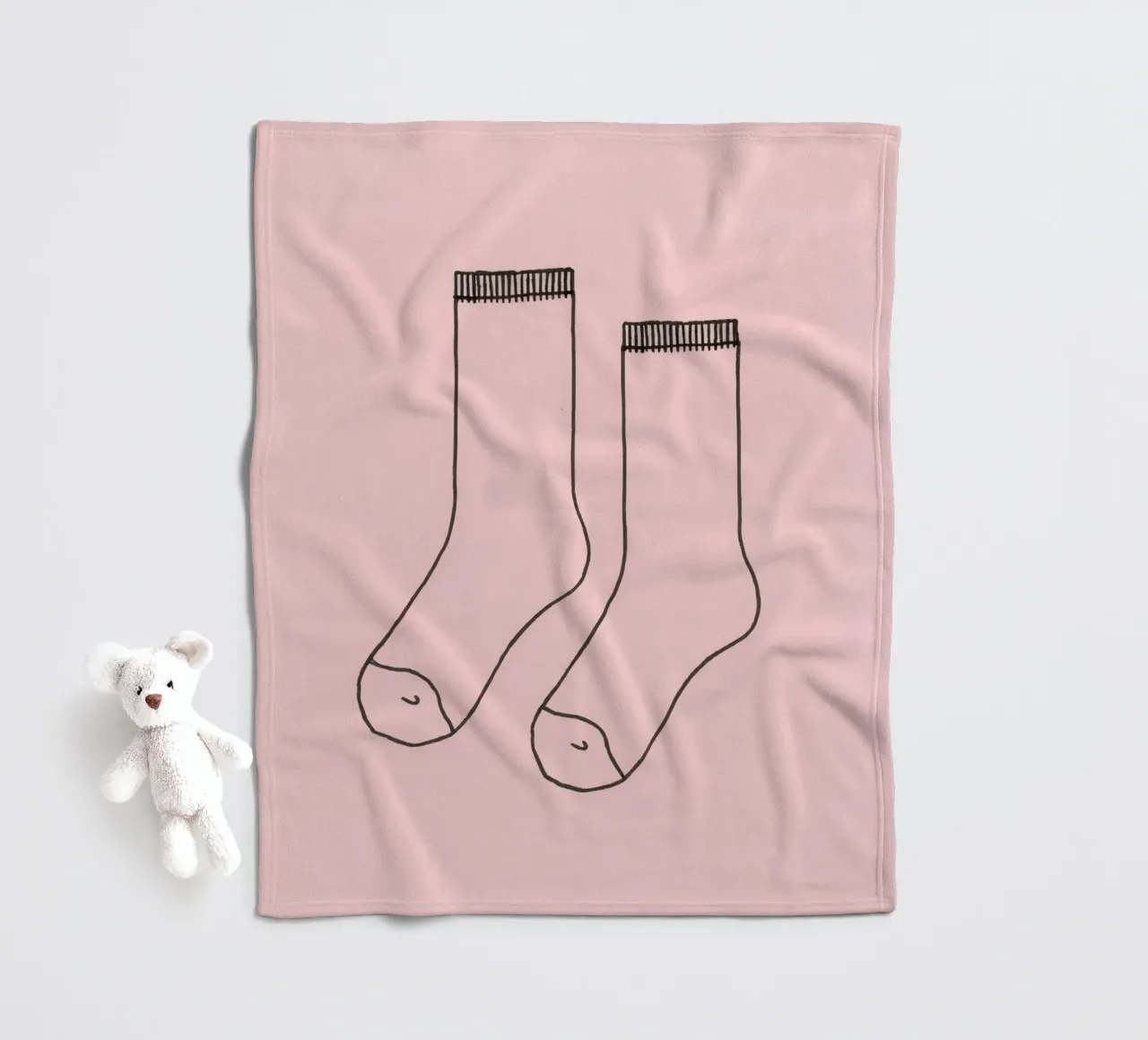 Simple design of a pair of socks with a pink background fleece blanket by DesignDoodle