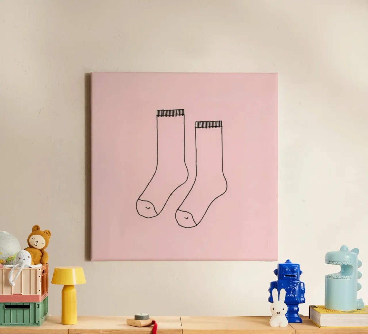 Simple design of a pair of socks with a pink background canvas by DesignDoodle