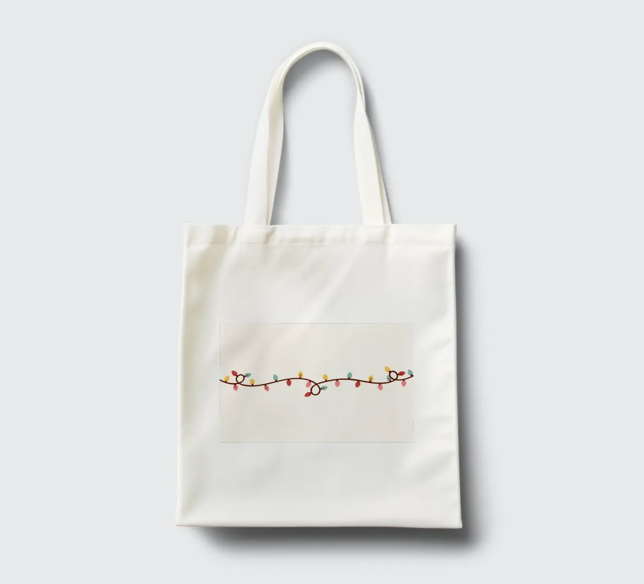 Lumières de Noël colorées - Art de la bordure de la guirlande lumineuse festive tote bag de ClubArt