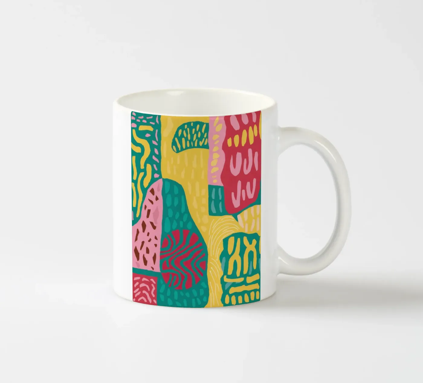 Vibrant Pattern Patchwork ceramic mug by Sentinel Glow