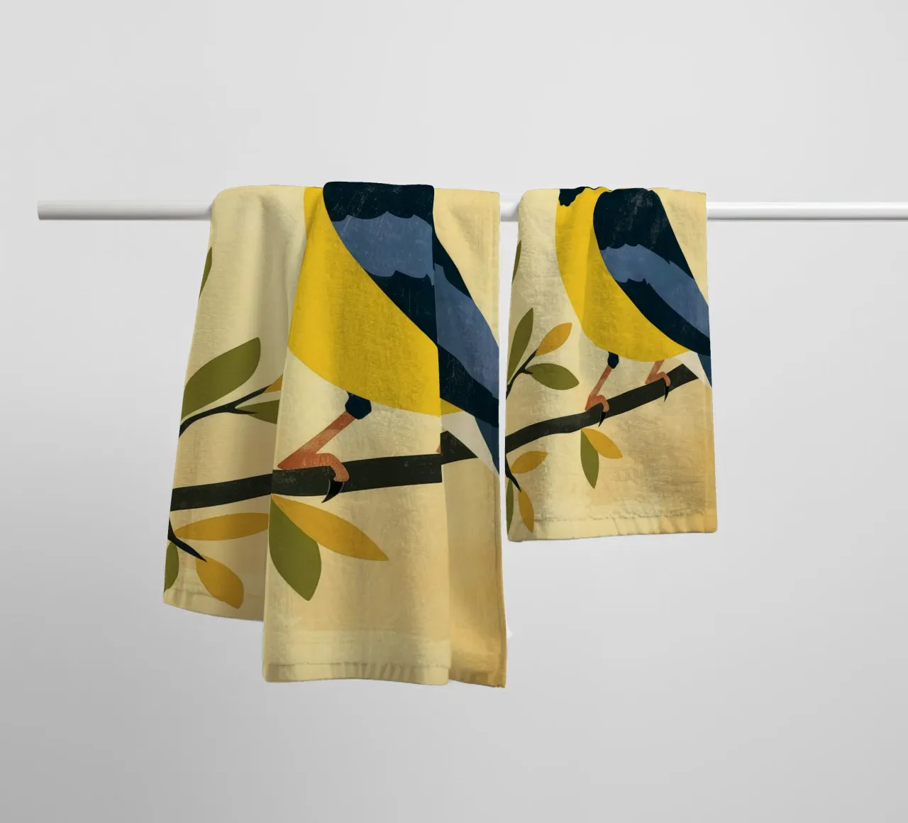 Yellow and blue bird perched on branch with leaves towel by DesignDoodle