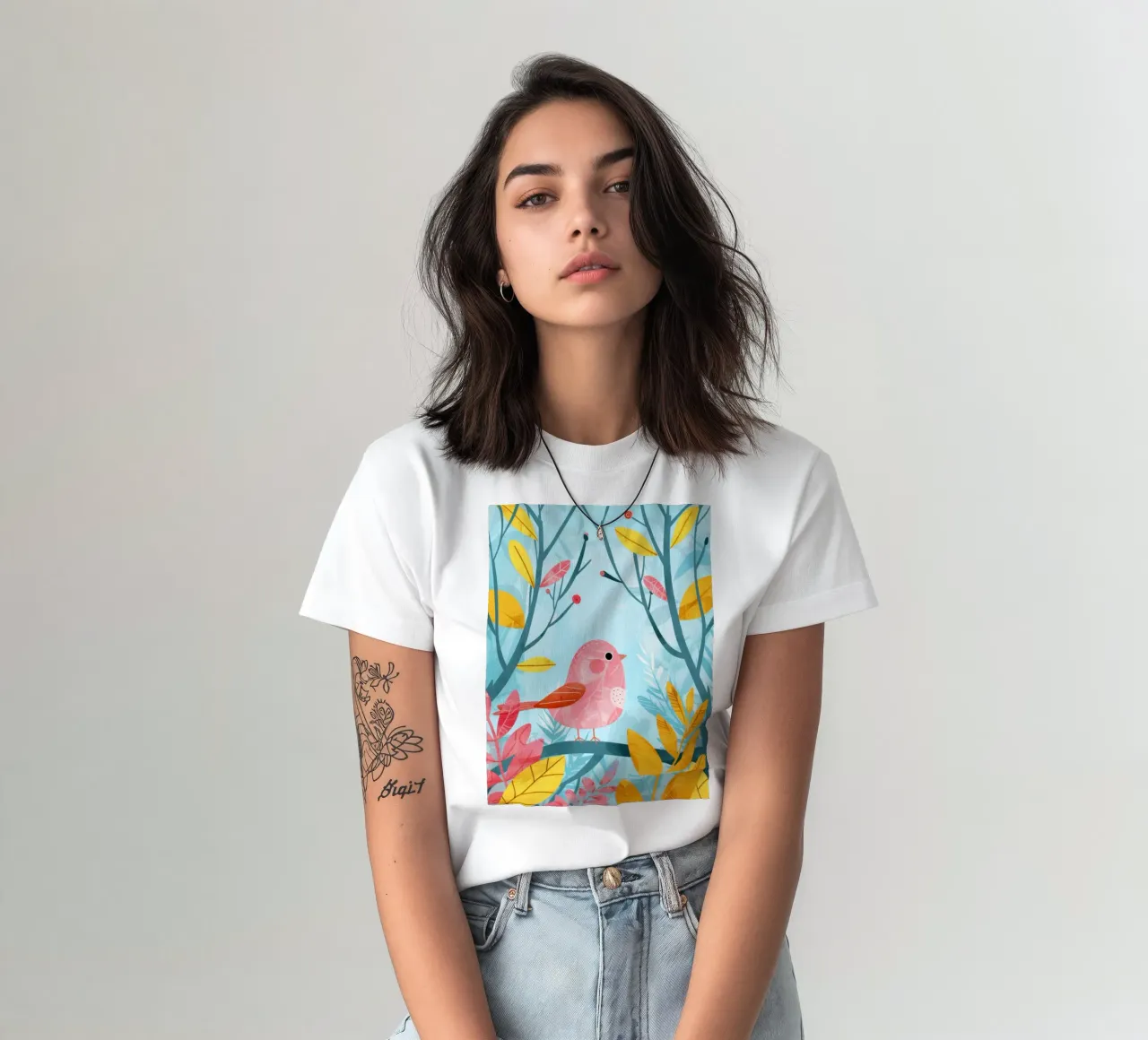 Pink bird perched on a branch surrounded by leafy plants t-shirt by DesignDoodle