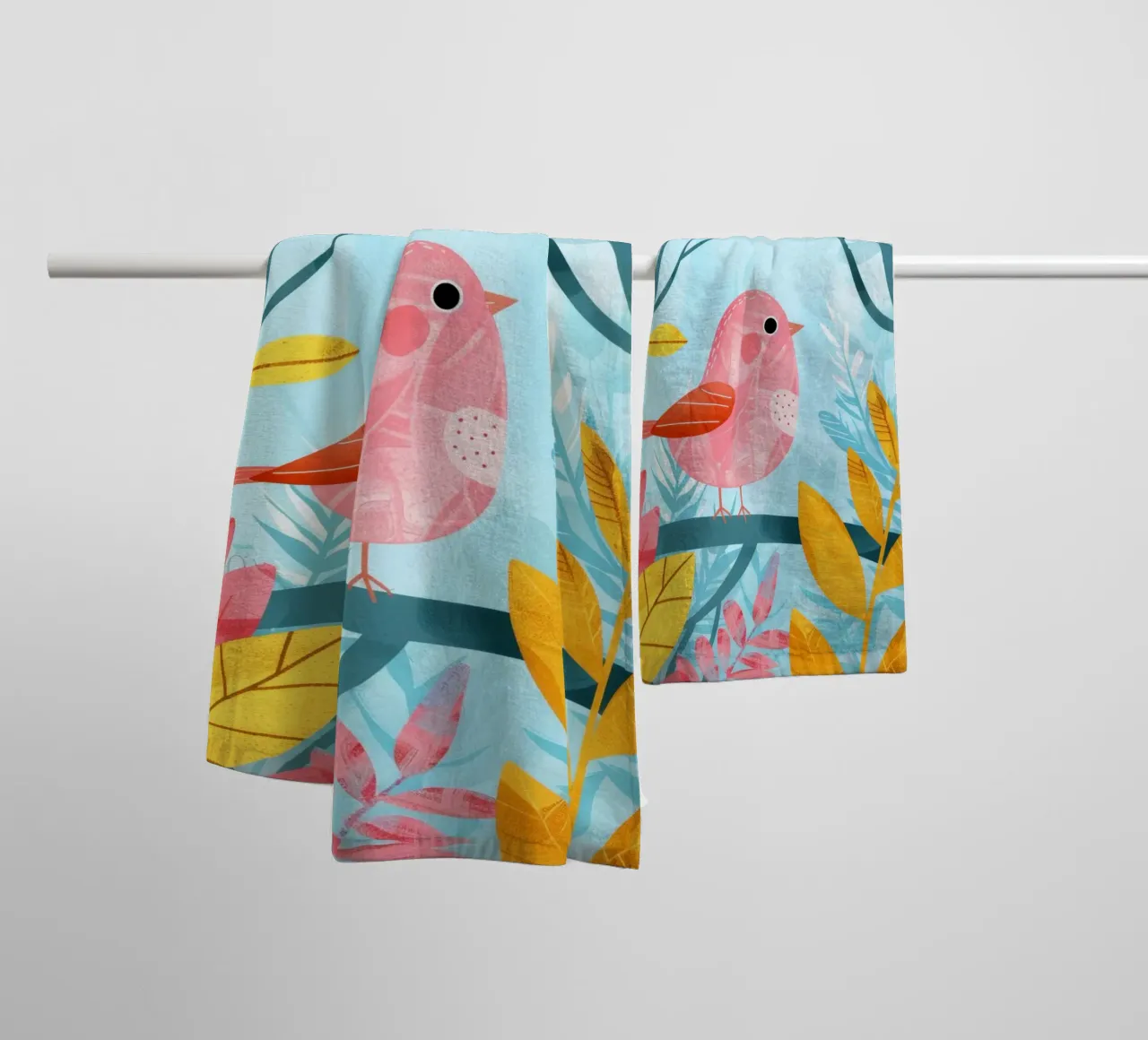 Pink bird perched on a branch surrounded by leafy plants towel by DesignDoodle
