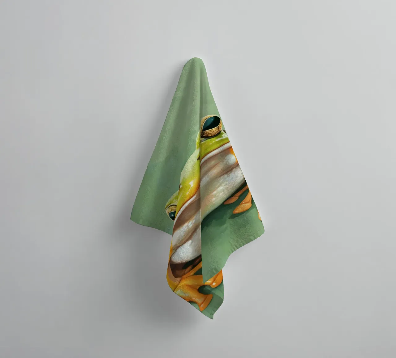 Green frog sitting on a smooth surface with striking eyes towel by DesignDoodle