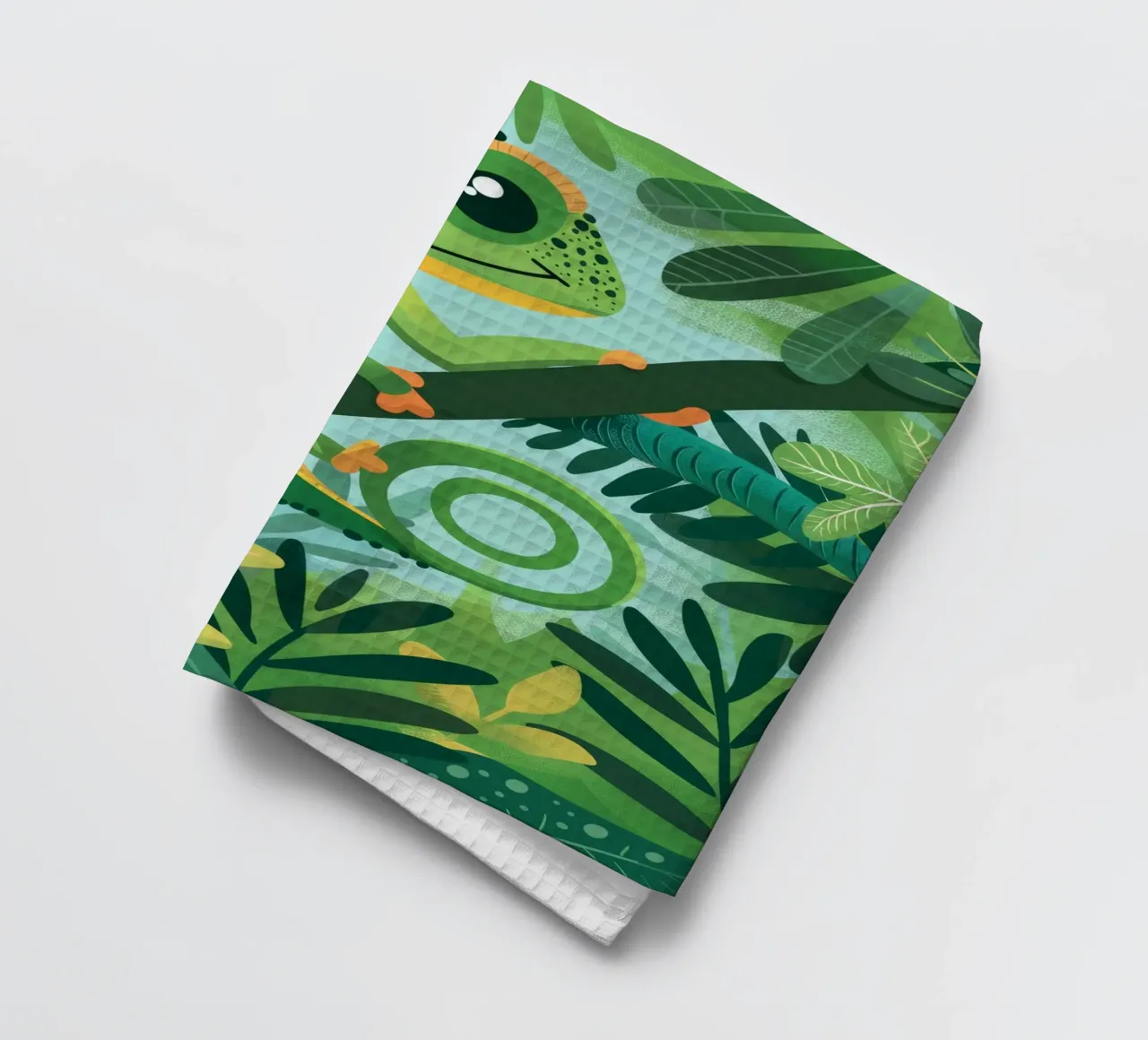 Whimsical chameleon perched on branch in lush jungle tea towel by DesignDoodle