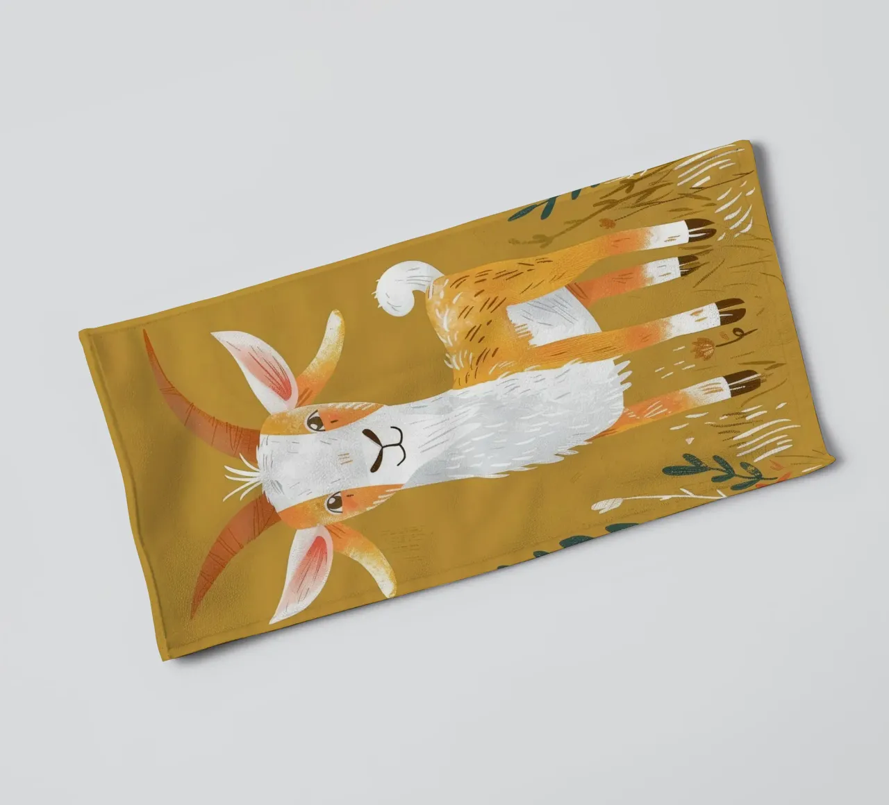 Ziege steht inmitten von hohem Gras in einer dekorativen, erdigen Umgebung Handtuch von DesignDoodle