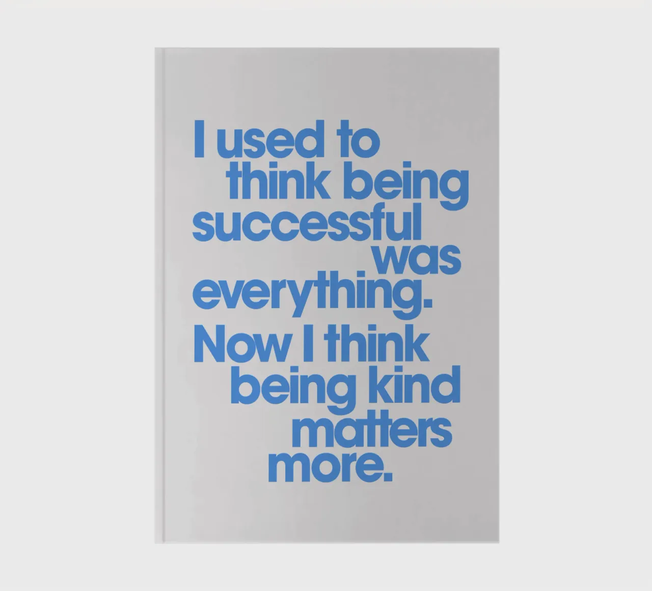 Being Kind Matters More Typography Quote Print in Blue notebook by THE MOTIVATED TYPE