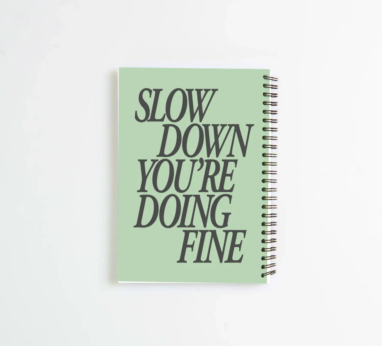 Slow Down You’re Doing Fine Calm Mint Green Type Print spiral notebook by THE MOTIVATED TYPE